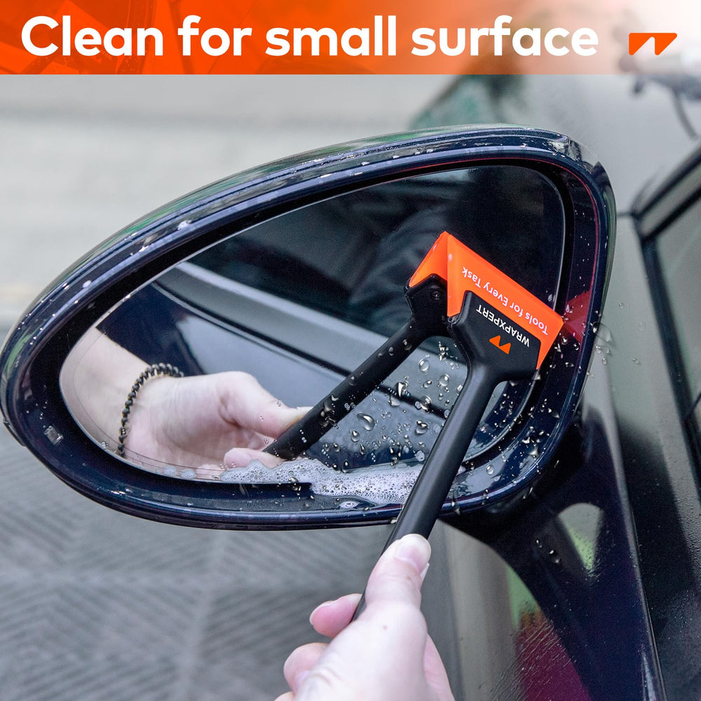 WRAPXPERT squeegees held in hand showing size and ergonomic grip for steady control