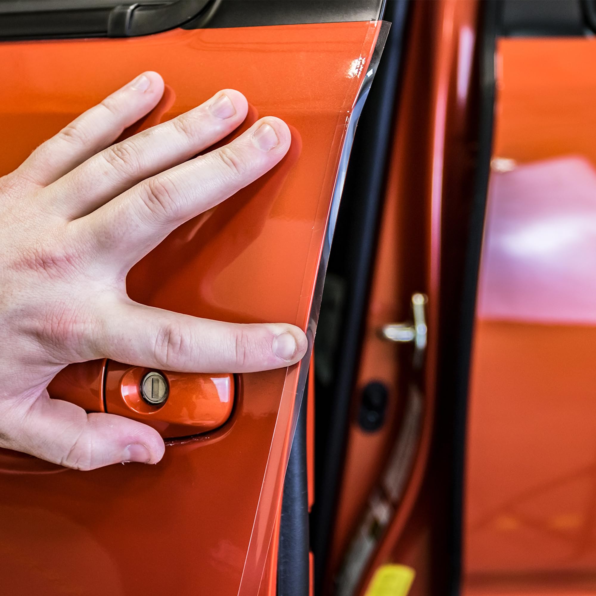 XPEL film self-healing demo heated to reduce scratch visibility and restore finish