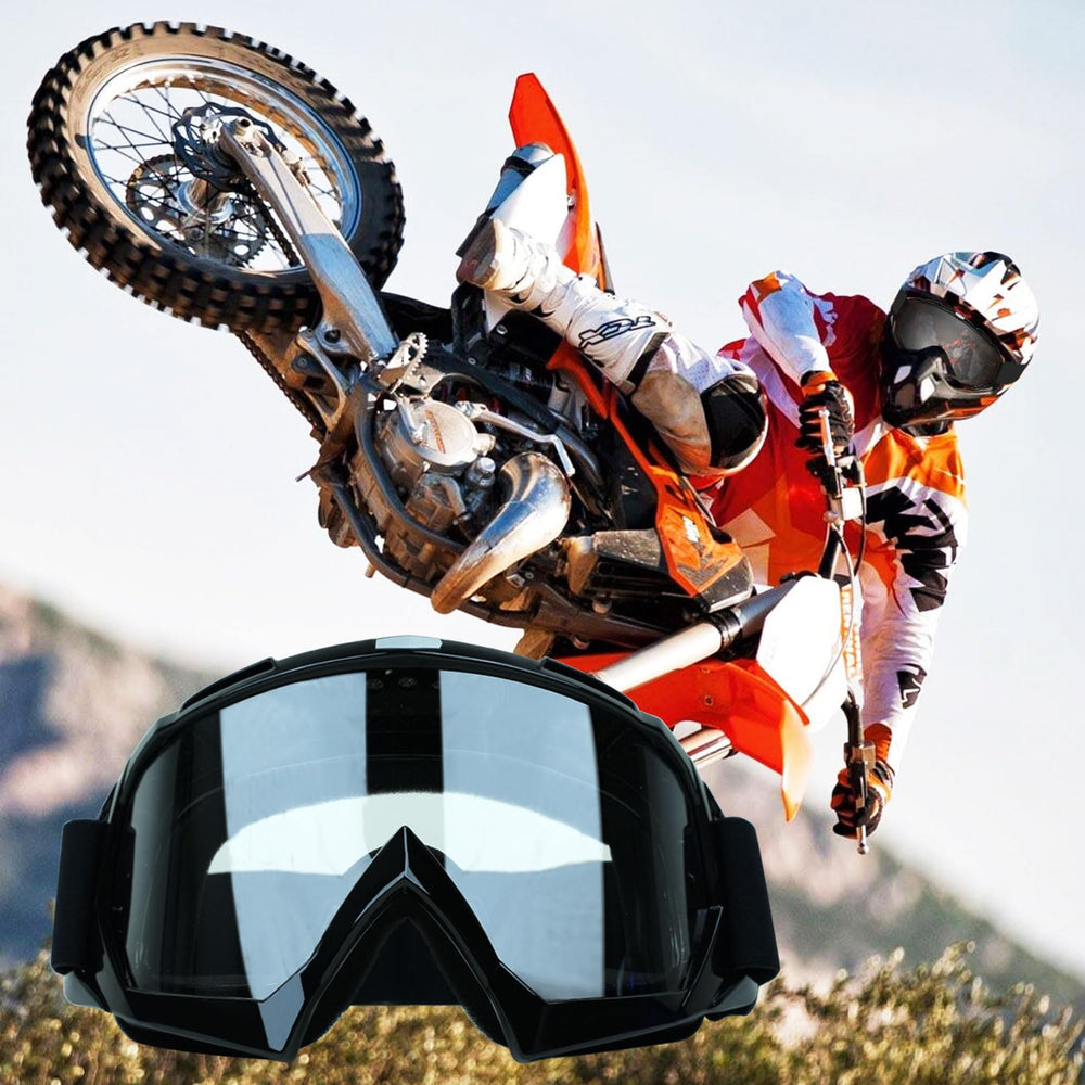XYOP goggles in hand to show lightweight size and portability