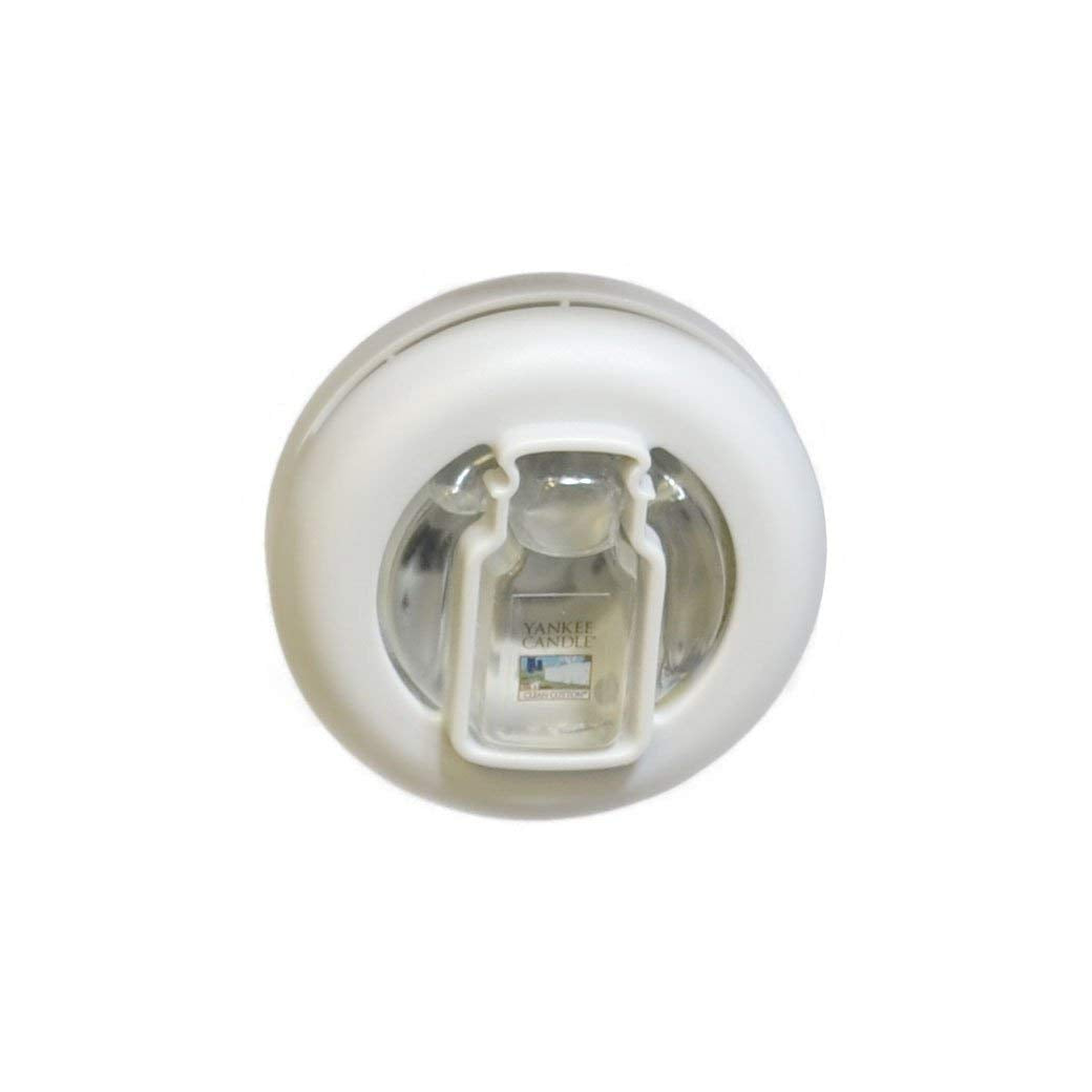 Yankee Candle clean cotton vent clip installed on a car vent delivering continuous odor control