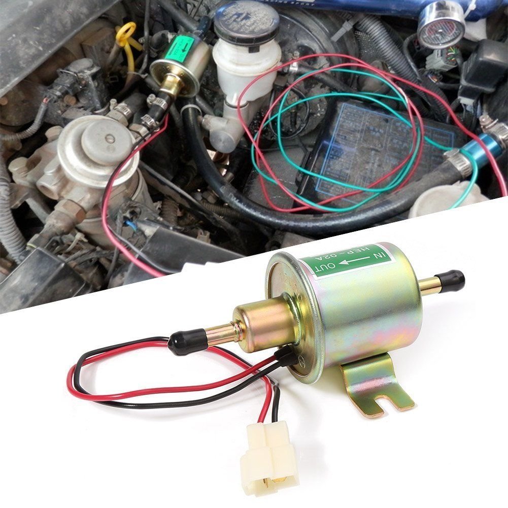 YONEDA pump next to a car battery showing compact size and 12V compatibility