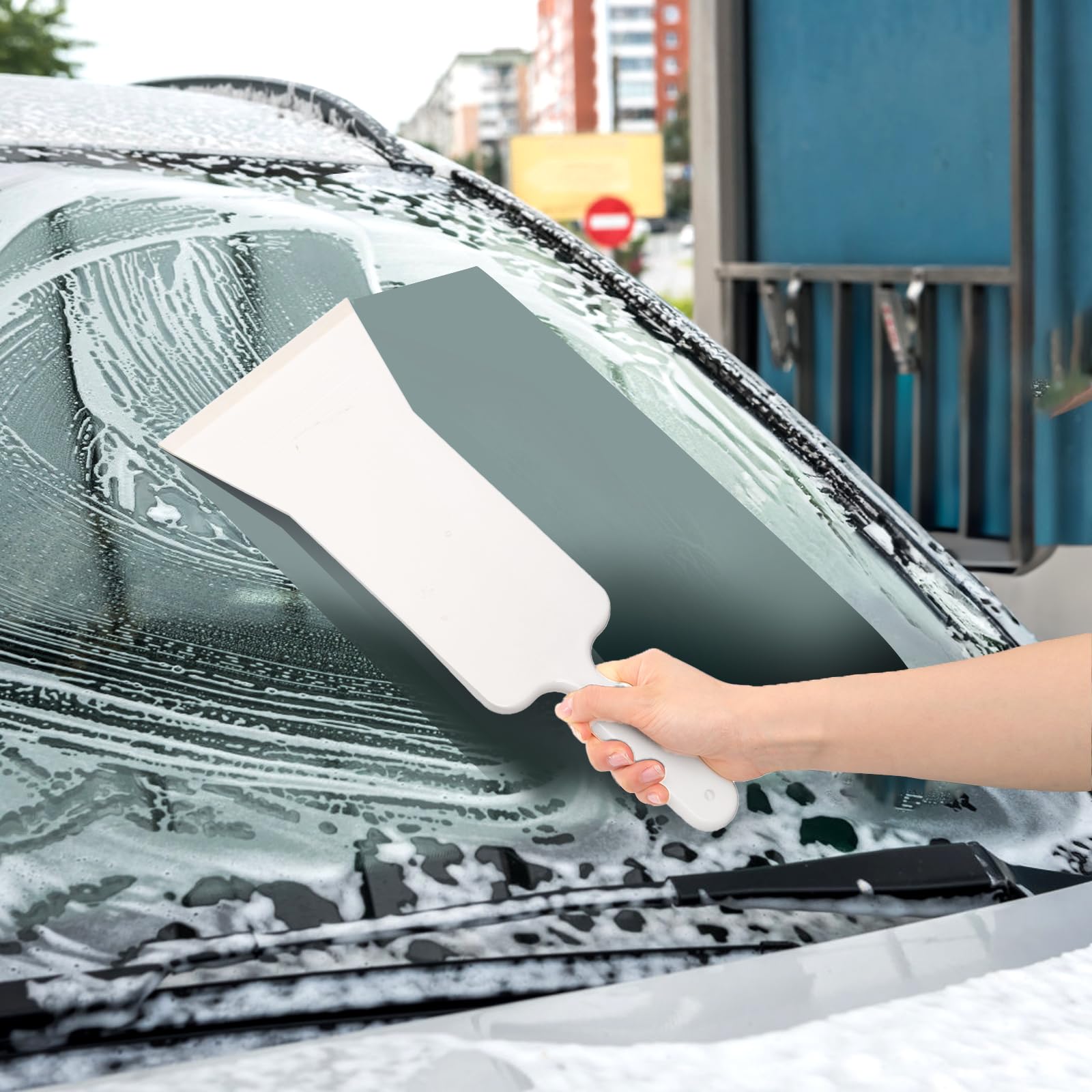 ZAVOOS tools clearing a car windshield quickly for improved visibility