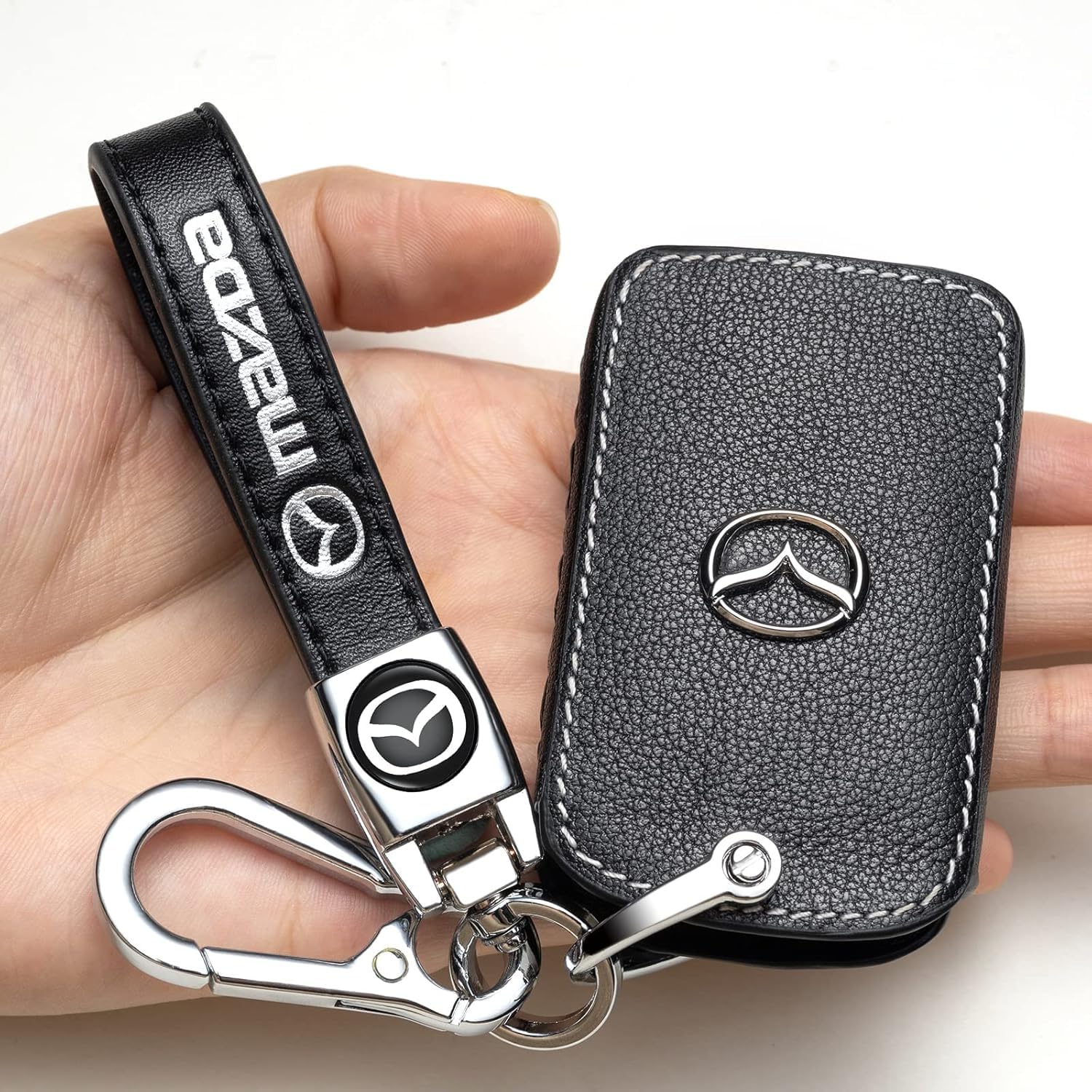 ZERAL case beside keys showing scale and secure metal keyring attachment